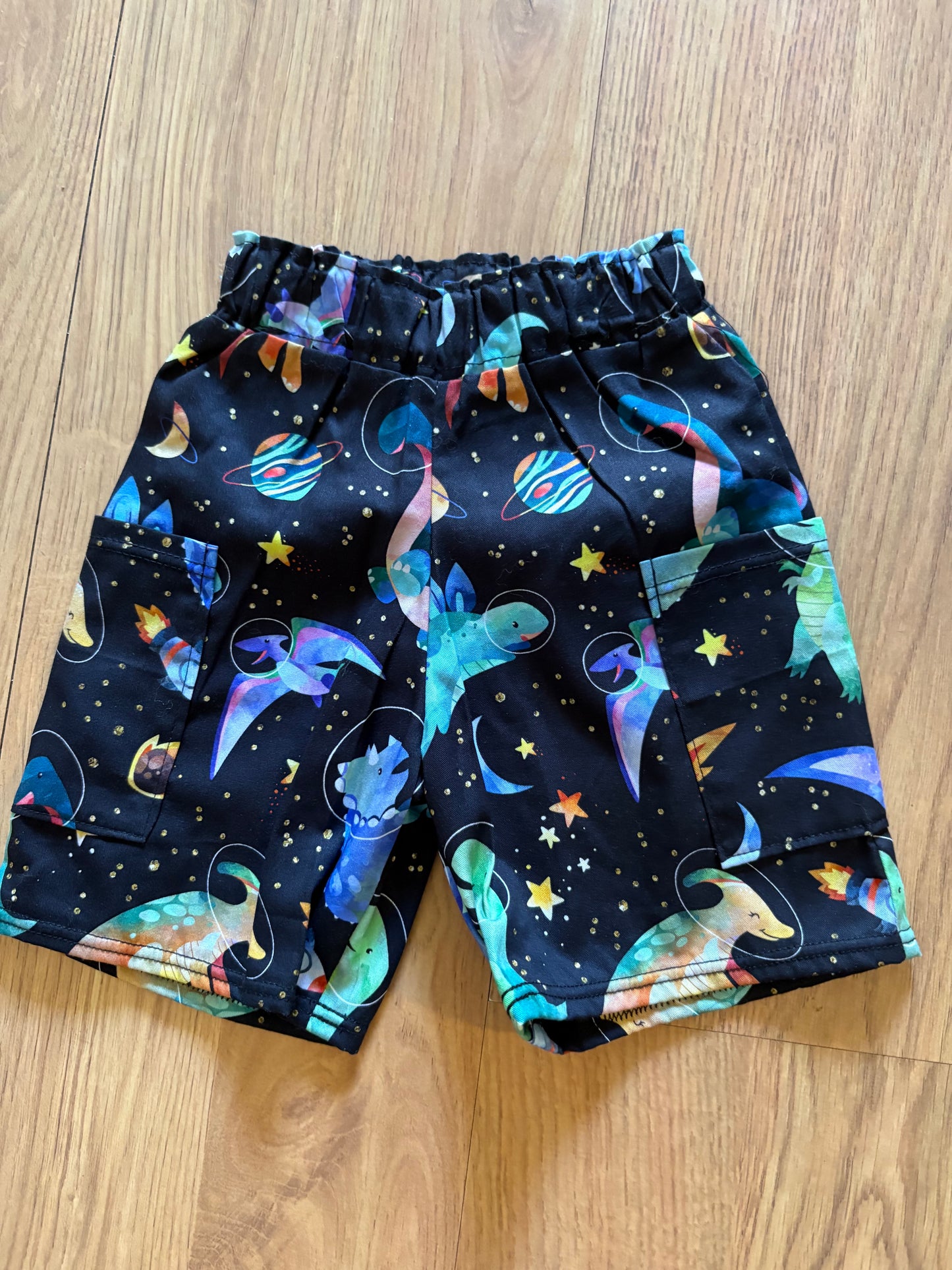 Space Dino shorts - Size 0